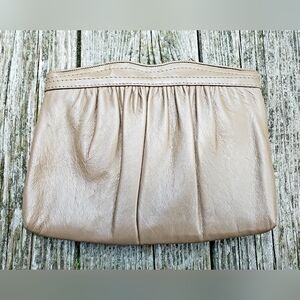 little taupe convertible leather clutch • by andé